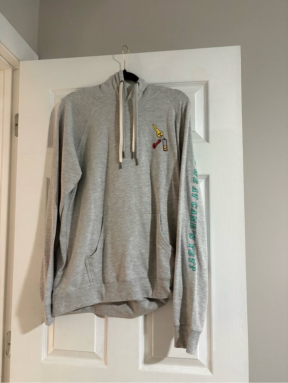 Gray Pullover Hoodie with Small Chest Graphic